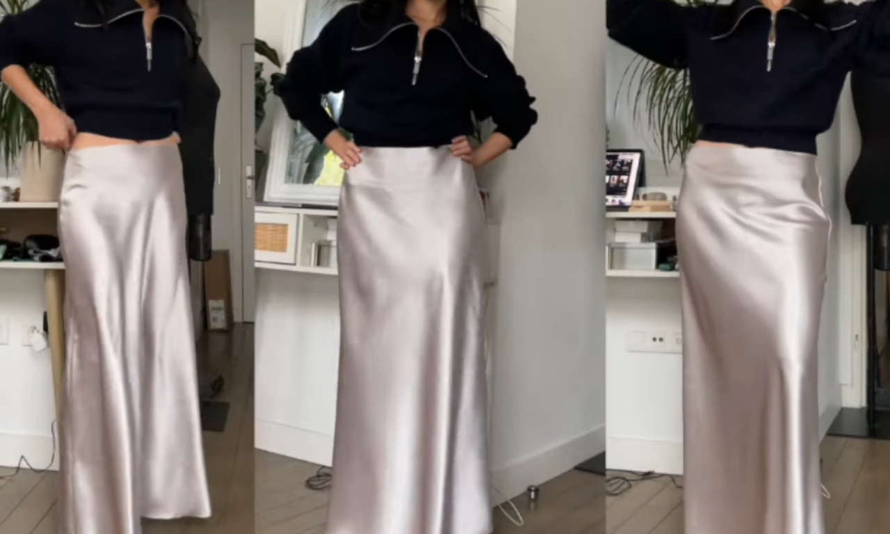 A three-panel image showing a woman modeling a finished, long, silvery satin slip skirt paired with a dark navy zippered top to show the final result of the DIY project.