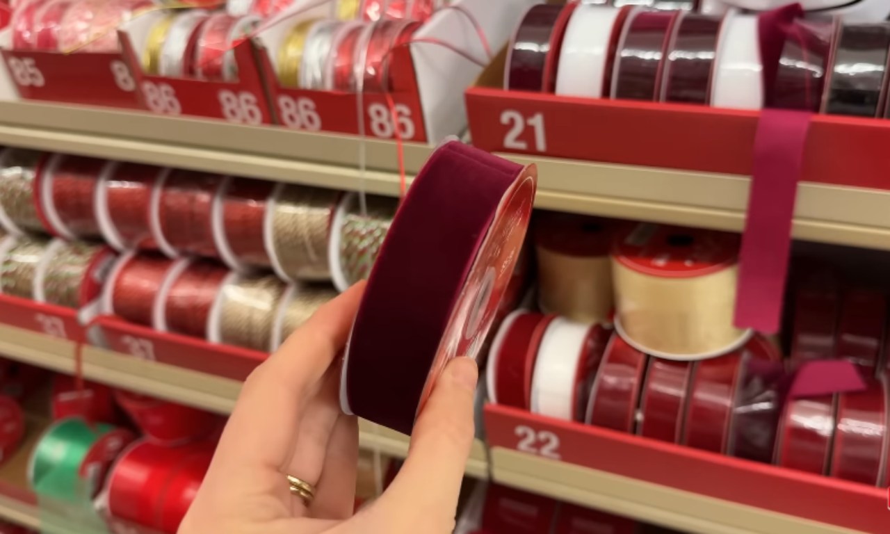 Burgundy velvet ribbon on a spool
