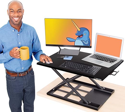 The 10 Best Standing Desk Converters for a Healthier Workday: Our Expert Picks Stand Steady X-Elite Pro, Ergonomic Adjustable Height Standing Desk Converter for Home or Office, Easy Lift Sit to Stand Laptop Desk Riser for Laptop and Computer Monitor (Black, 28in x 20in)